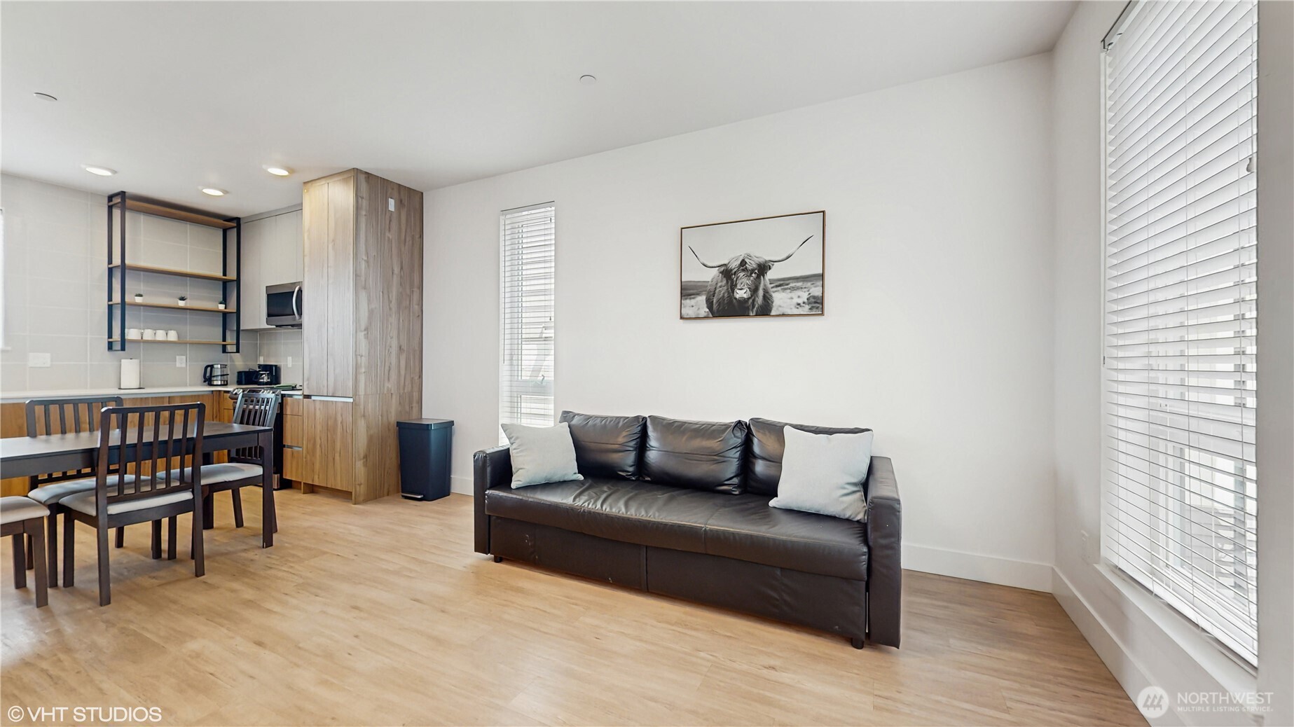 444 13th Avenue Seattle, WA 98122 - Photo 6 of 36 a living room with furniture and a wooden floor