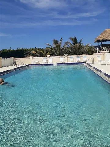 a view of a lake and sunset