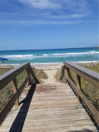 a view of outdoor space with wooden deck