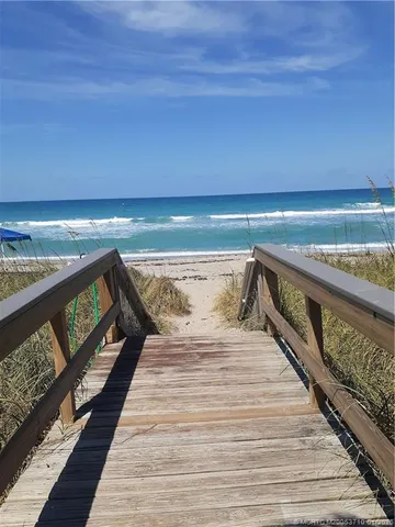 a view of outdoor space with wooden deck