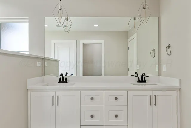 a white bath tub sitting next to a window