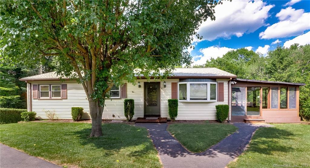 218 Byron Road Meriden, CT 06451 - Photo 1 of 1 a front view of a house with a garden
