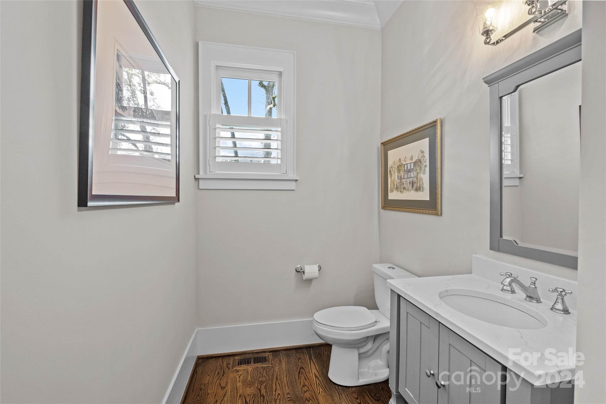5629 Closeburn Road Charlotte, NC 28210 - Photo 12 of 44 a bathroom with a sink toilet and vanity