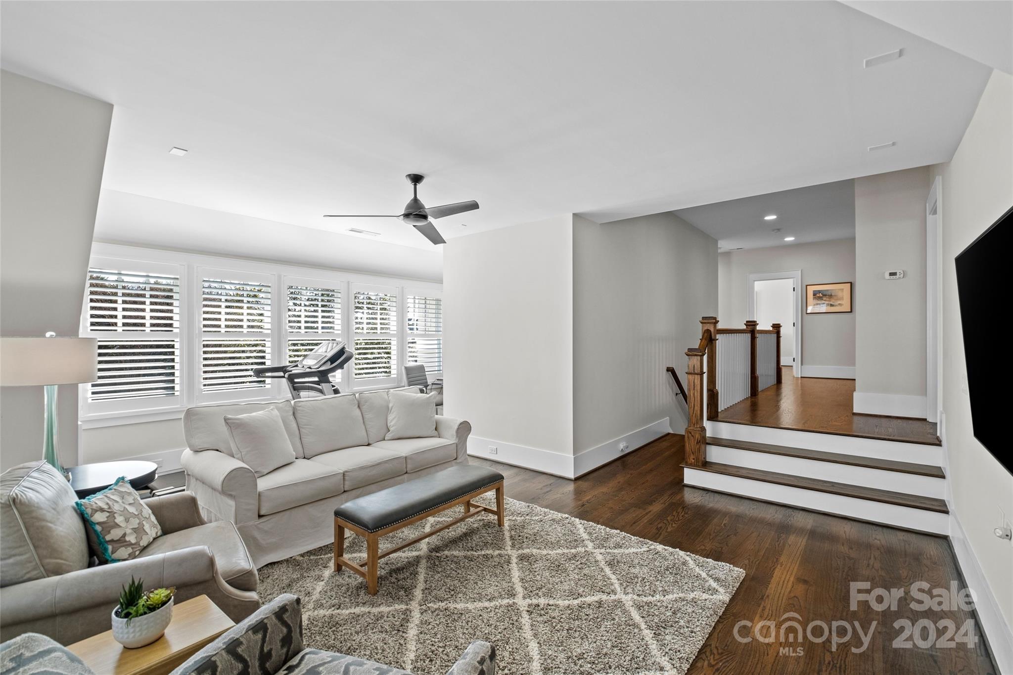 5629 Closeburn Road Charlotte, NC 28210 - Photo 26 of 44 a living room with furniture and a rug