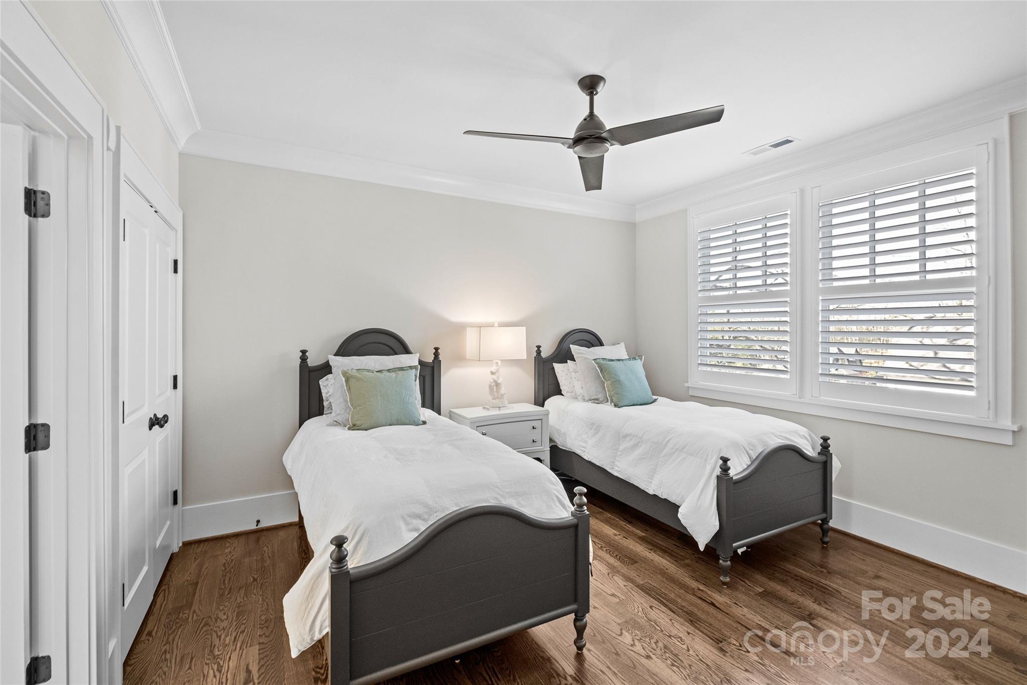 5629 Closeburn Road Charlotte, NC 28210 - Photo 32 of 44 a bedroom with two beds and a window