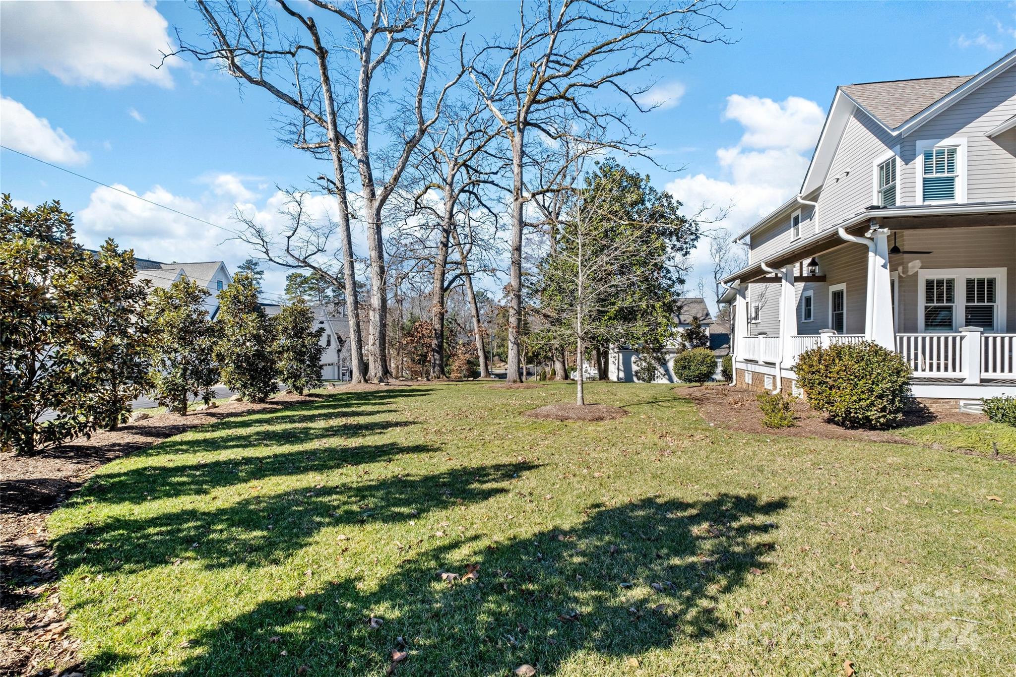 5629 Closeburn Road Charlotte, NC 28210 - Photo 38 of 44 a front view of a house with a yard