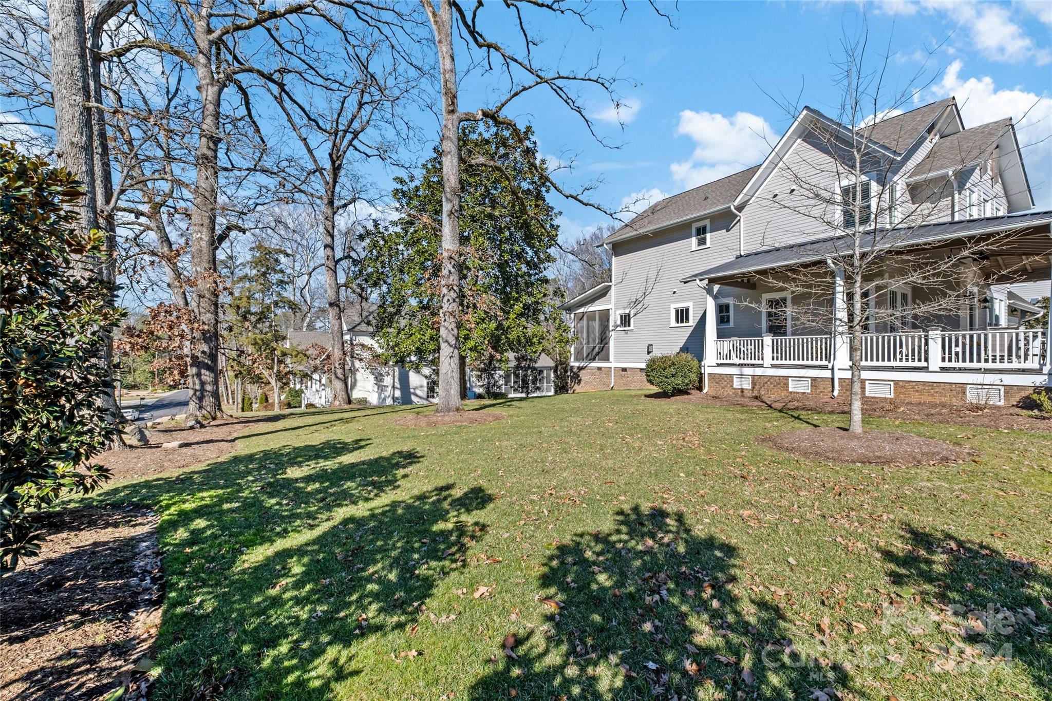 5629 Closeburn Road Charlotte, NC 28210 - Photo 39 of 44 a view of a house with a yard