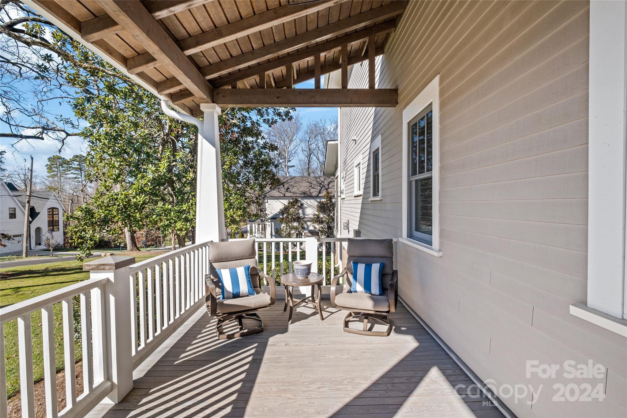 5629 Closeburn Road Charlotte, NC 28210 - Photo 6 of 44 a view of a porch with furniture
