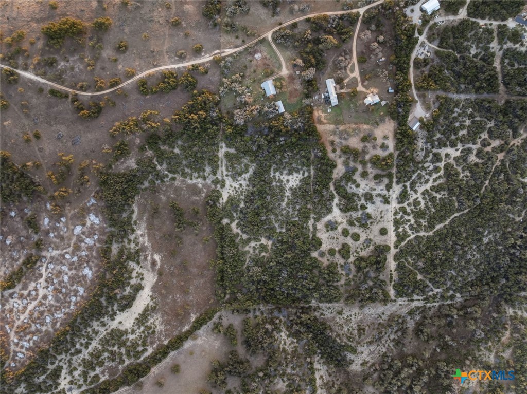 3003 Old Red Ranch Road Johnson City, TX 78636 - Photo 6 of 17 a view of a dry yard