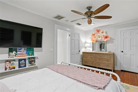 a bathroom with a toilet a sink and a mirror