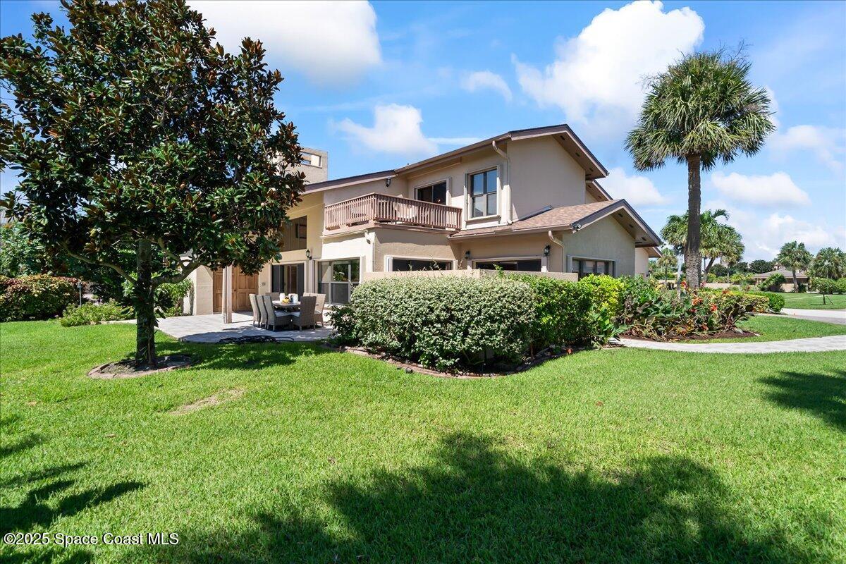 208 The Road, Unit C2 Melbourne Beach, FL 32951 - Photo 49 of 65 View of side yard