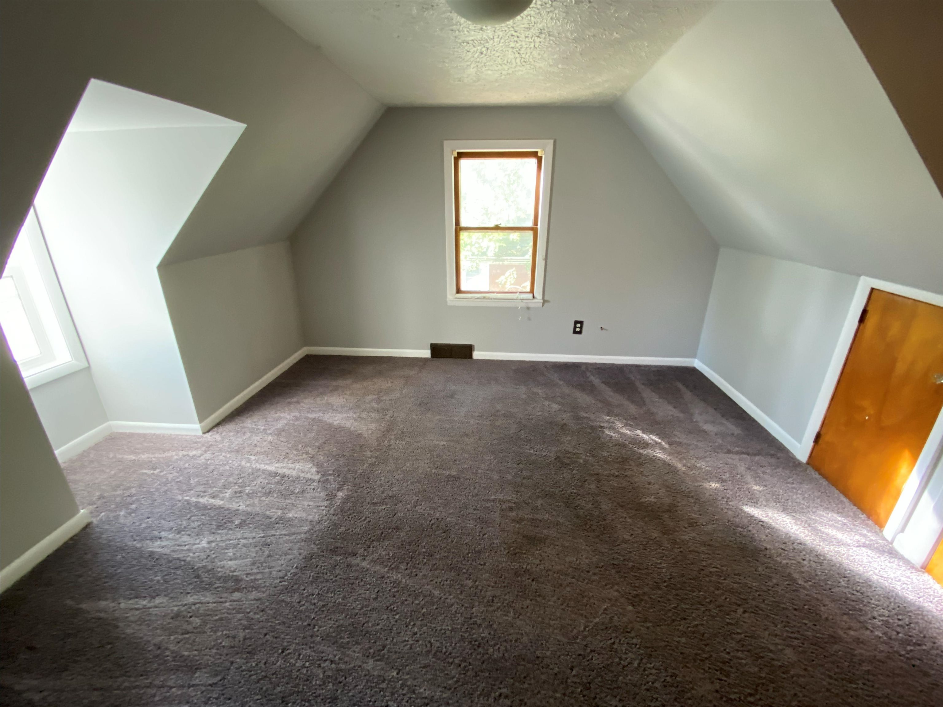 611 West Locust Street Belvidere, IL 61008 - Photo 14 of 39 an empty room with windows