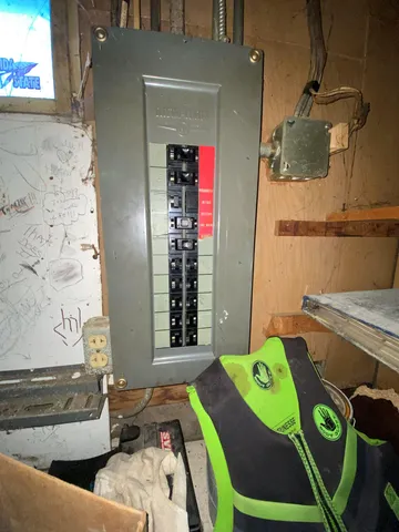 a view of a white house with a large space