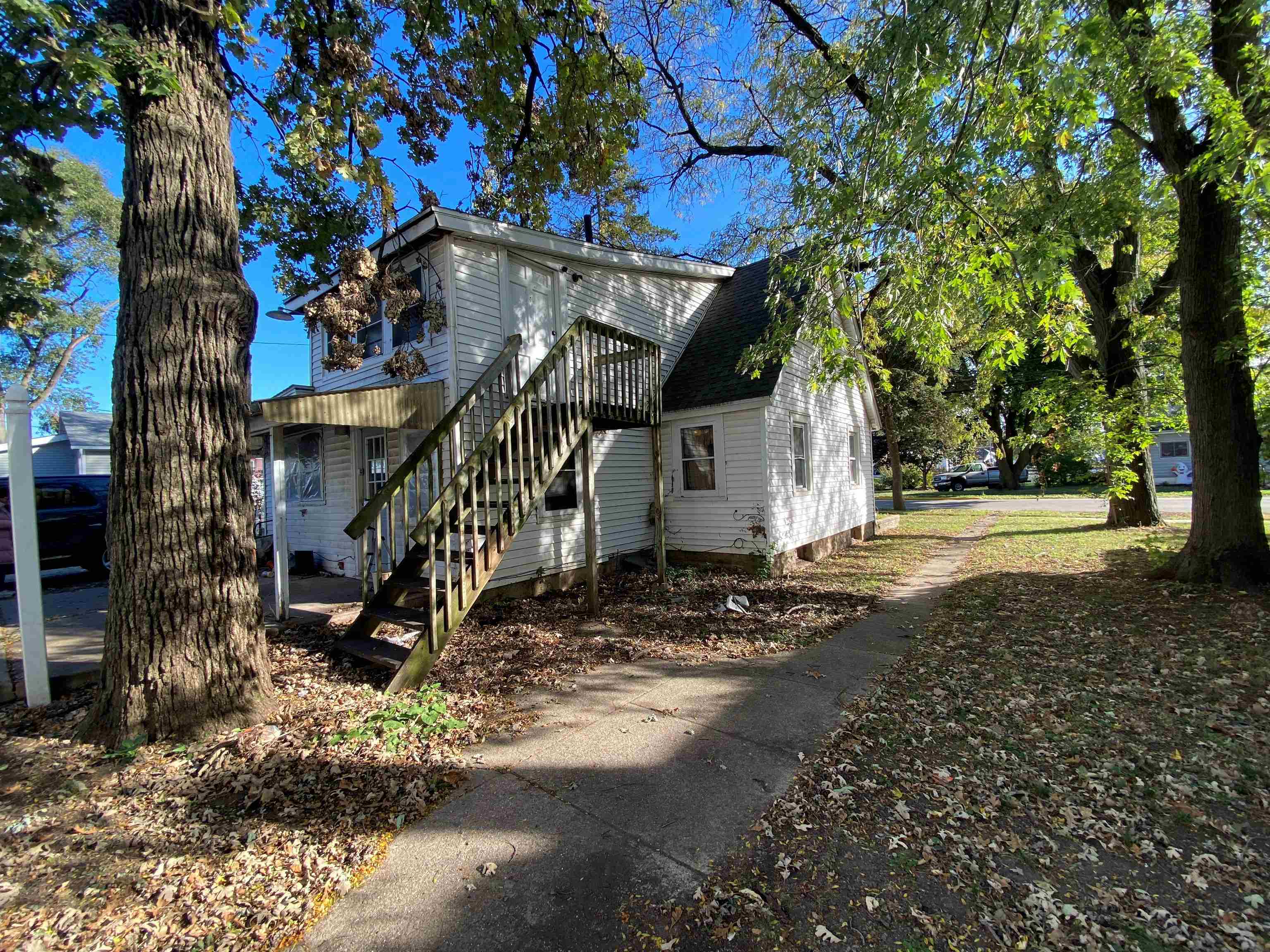 611 West Locust Street Belvidere, IL 61008 - Photo 20 of 39 a view of a house with a yard