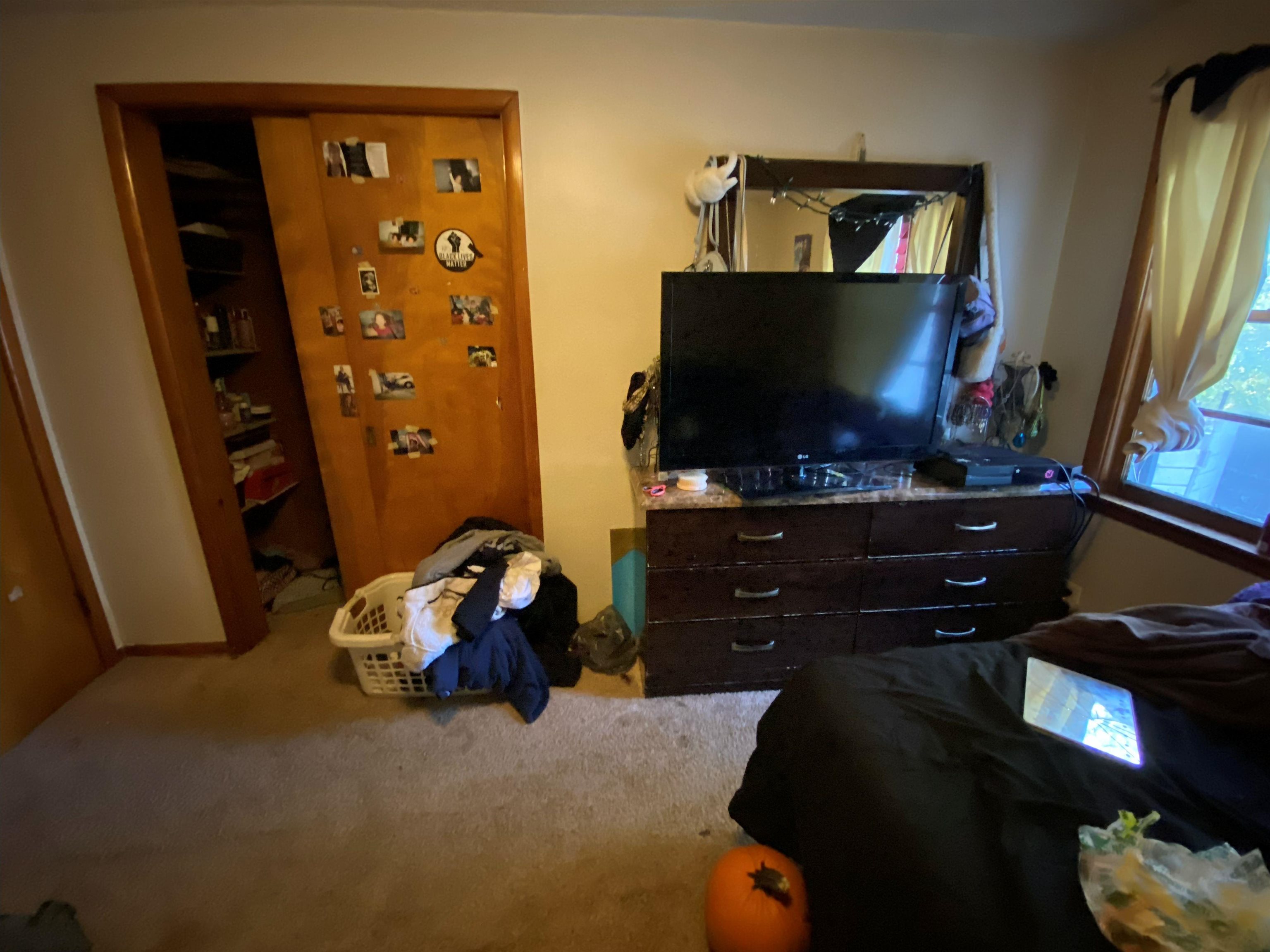 611 West Locust Street Belvidere, IL 61008 - Photo 29 of 39 a living room with furniture and a flat screen tv