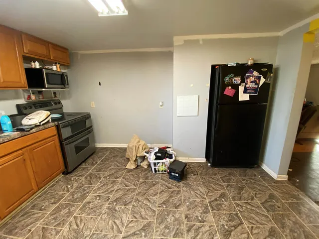 a bedroom with a bed and furniture