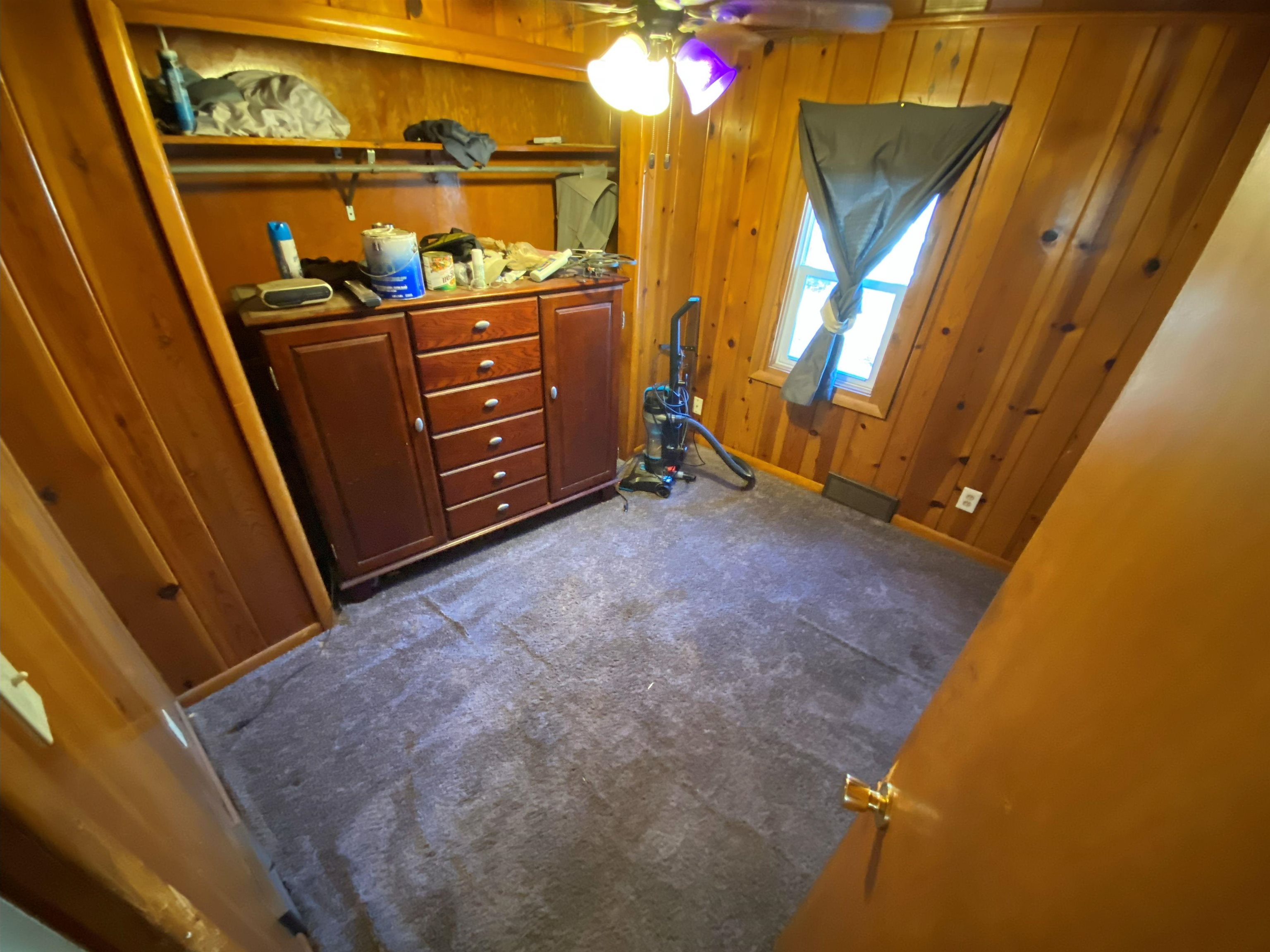 611 West Locust Street Belvidere, IL 61008 - Photo 9 of 39 a view of an empty room with wooden floor
