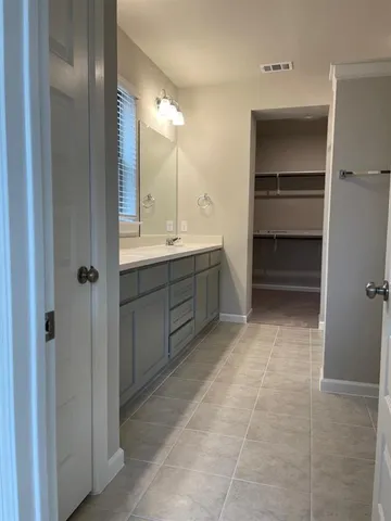 a view of backyard with a small cabin