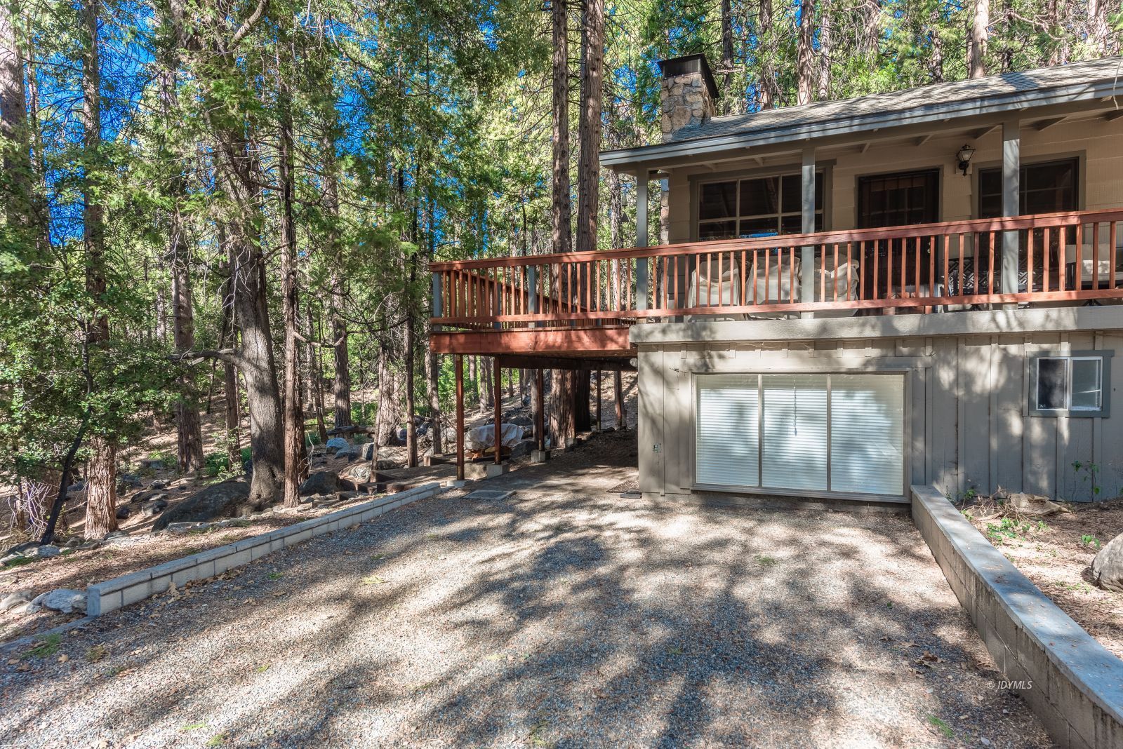 55180 Daryll Road Idyllwild, CA 92549 - Photo 6 of 7 a view of a house with backyard and sitting area