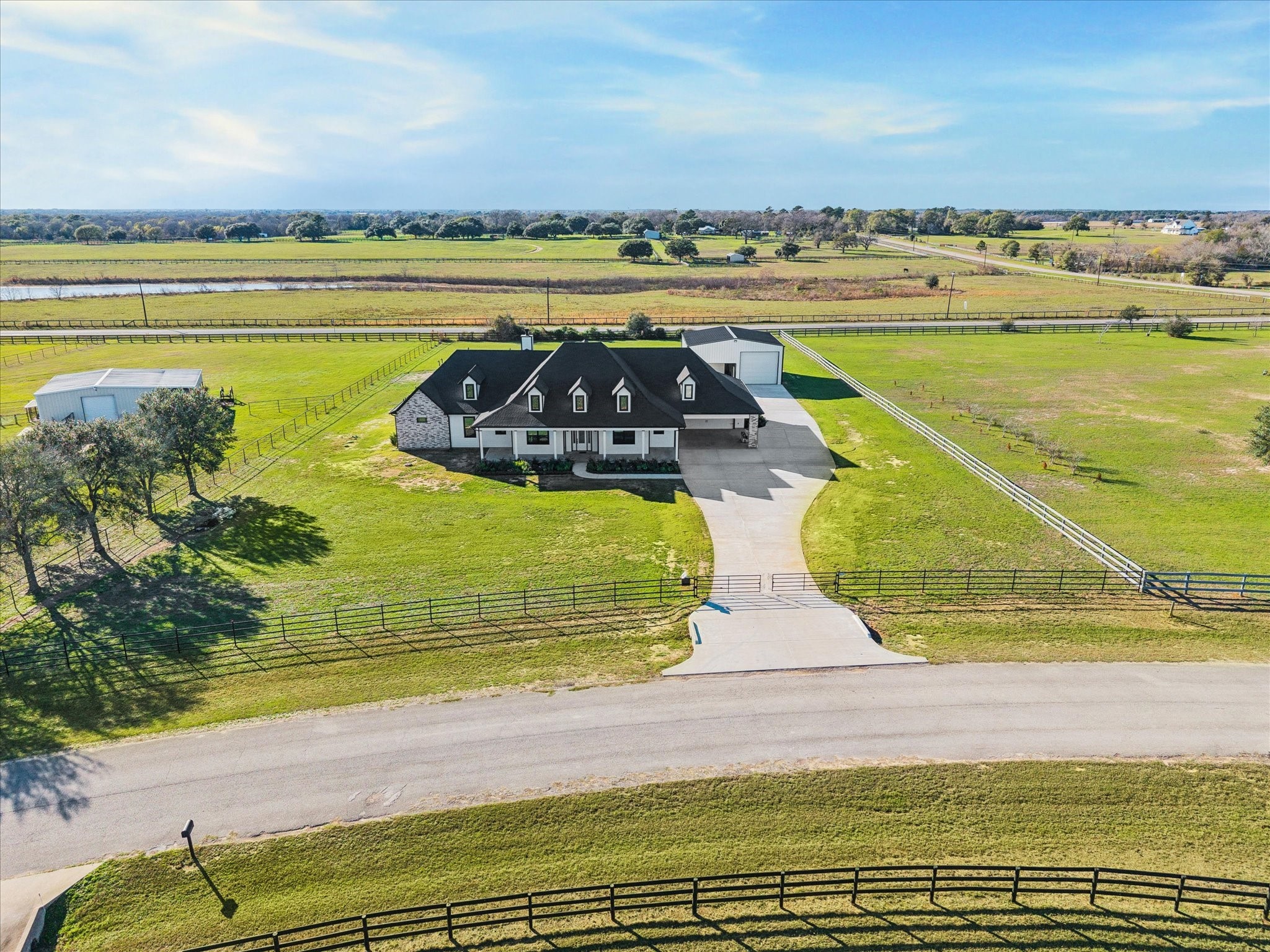 a view of a swimming pool and an outdoor seating