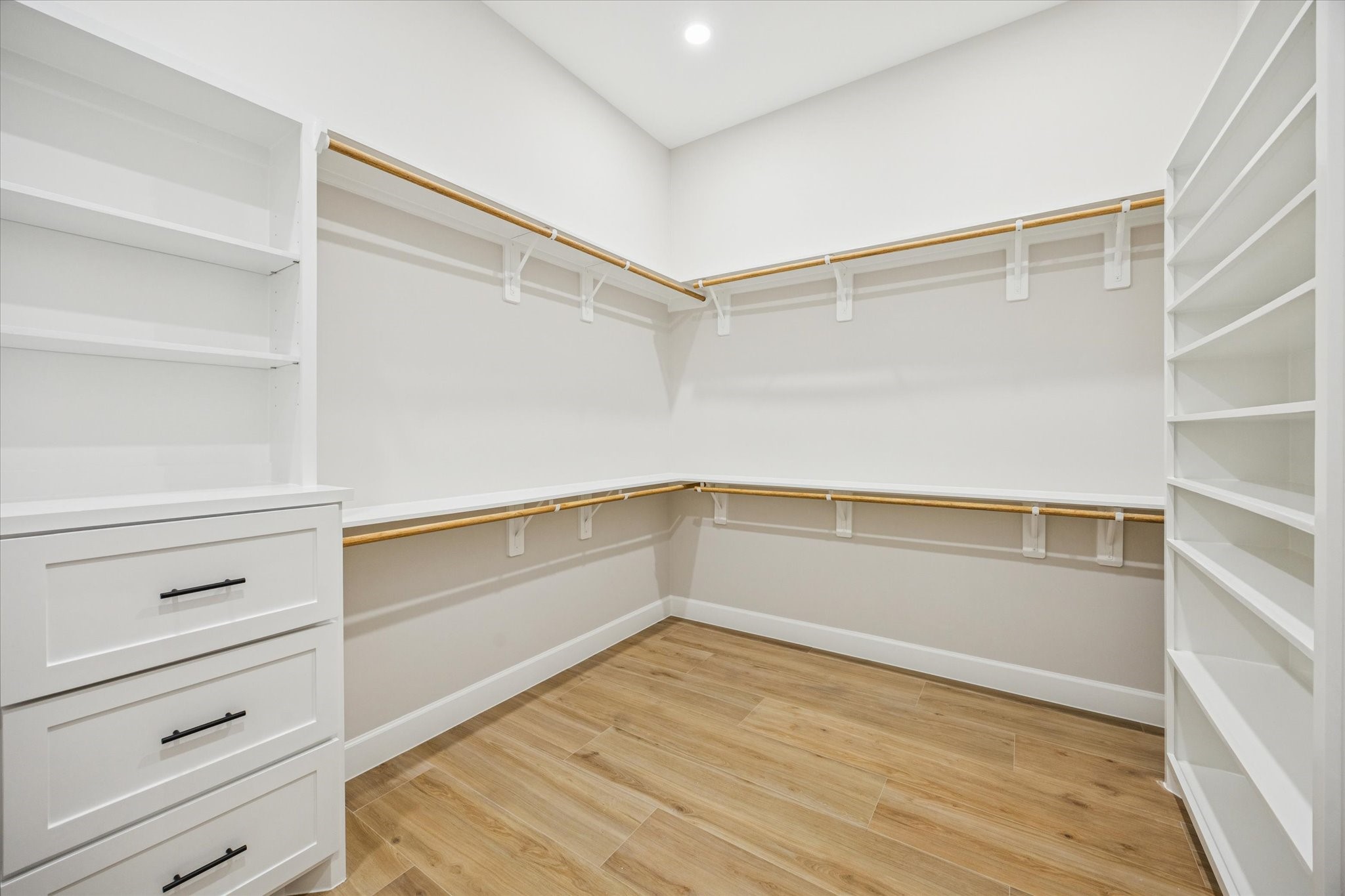 27645 Spring Hill Road Hempstead, TX 77445 - Photo 18 of 32 a view of an empty walk in closet