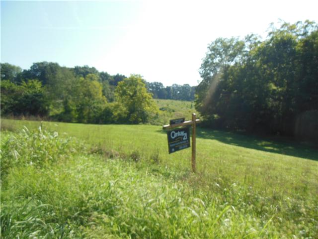 2815 Ewell Elliott Road Springfield, TN 37172 - Photo 3 of 6 a view of a lake with a yard
