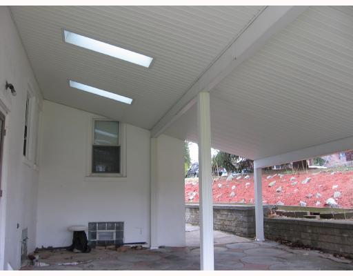 154 Hawthorne Road Pittsburgh, PA 15209 - Photo 6 of 7 Patio/Deck. Covered patio has sky lights and unique stone flooring!