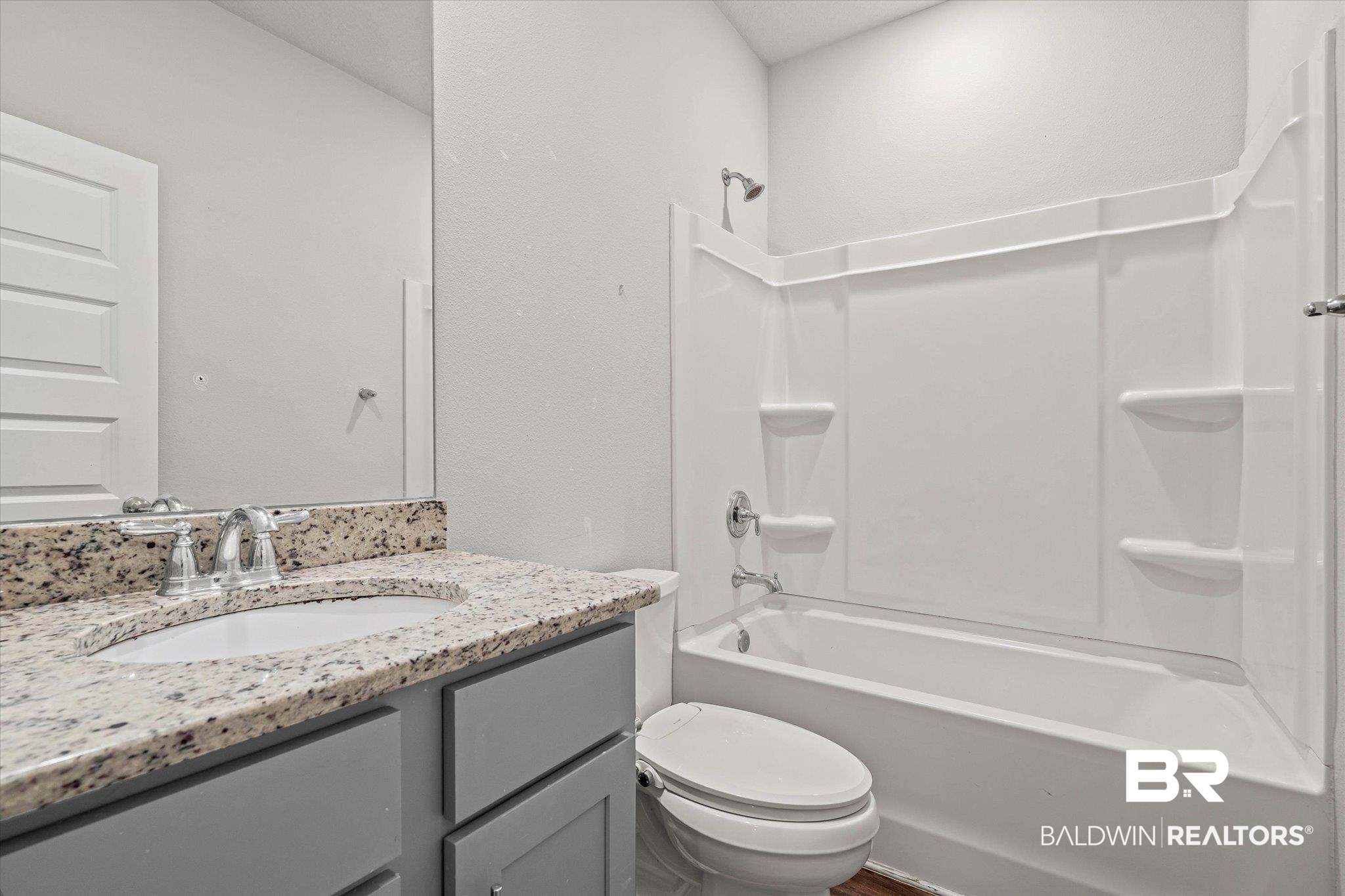 10207 Dunleith Loop Daphne, AL 36526 - Photo 14 of 23 Full bathroom featuring washtub / shower combination and vanity