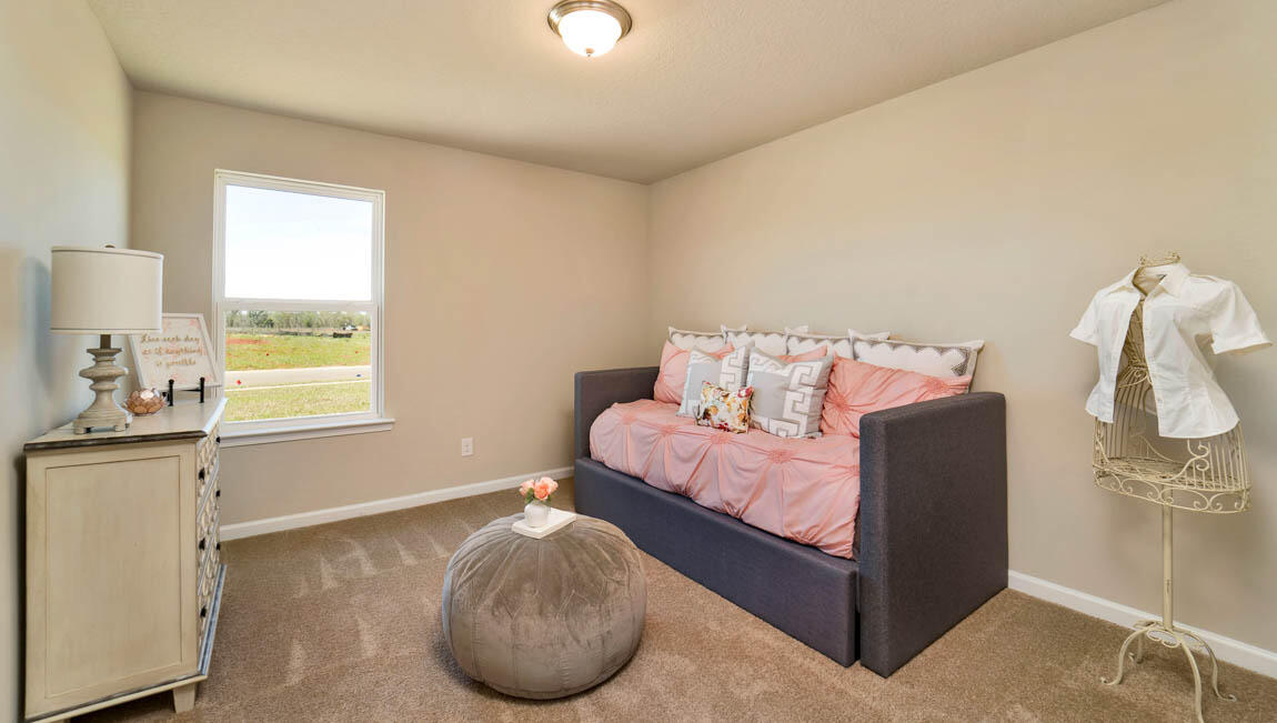 30 Fannin Street Freeport, FL 32439 - Photo 11 of 16 a bedroom with a bed and window