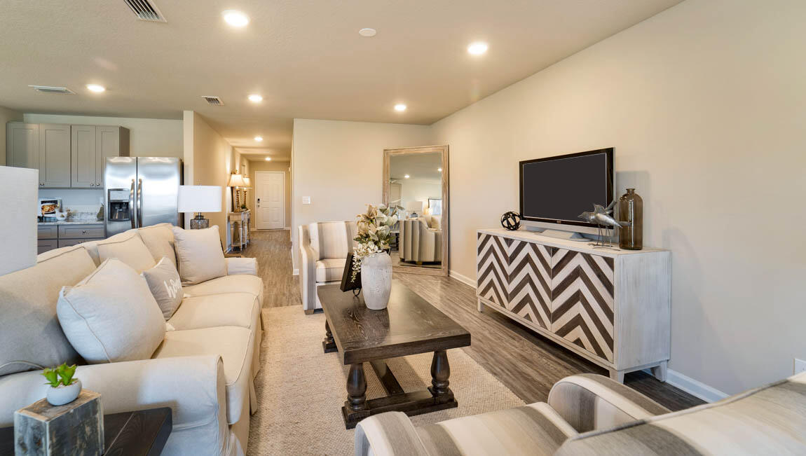 30 Fannin Street Freeport, FL 32439 - Photo 7 of 16 a living room with furniture and a flat screen tv