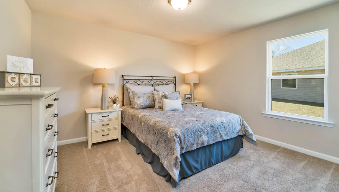 30 Fannin Street Freeport, FL 32439 - Photo 10 of 16 a bedroom with a bed and a window