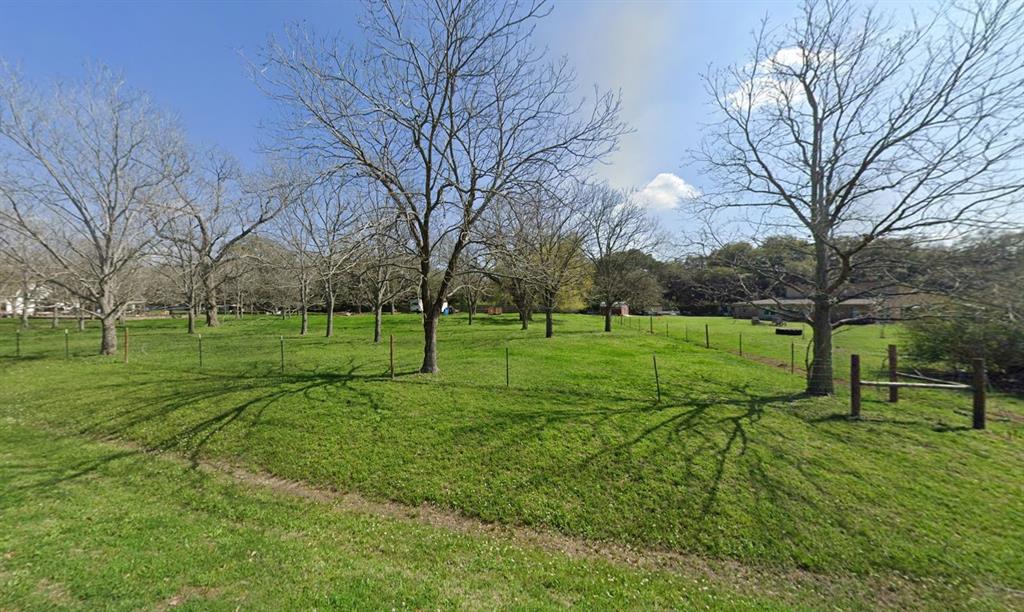 509 Brockman Road Wharton, TX 77488 - Photo 2 of 6 View of yard with a rural view