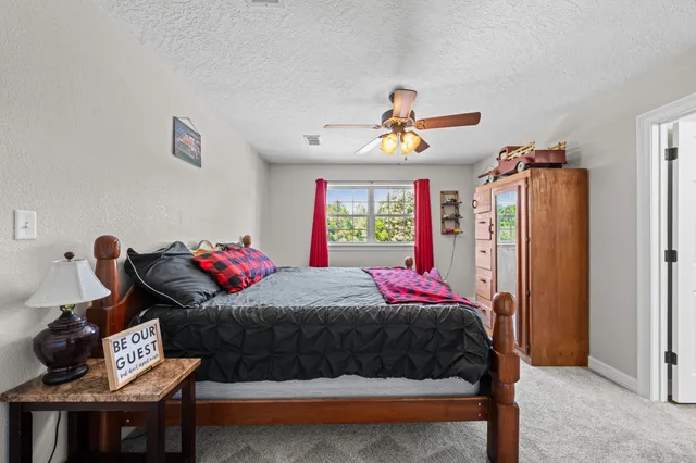 an aerial view of a house with a garden