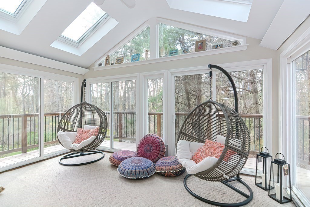 104 Channing Road Concord, MA 01742 - Photo 16 of 36 a living room with furniture and a large window