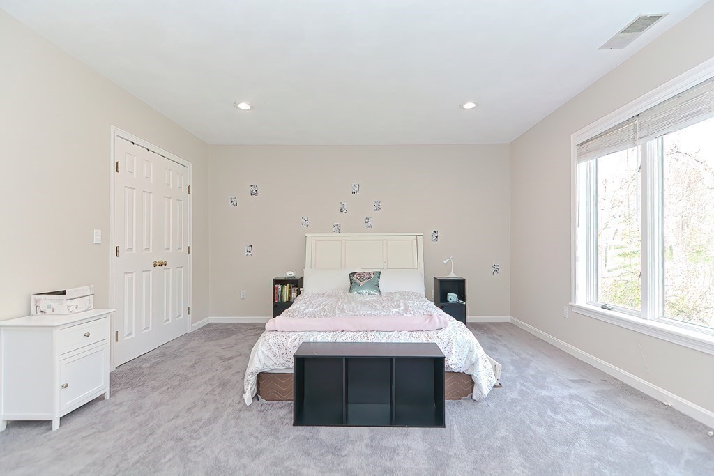 104 Channing Road Concord, MA 01742 - Photo 23 of 36 a bed room with a bed and a window