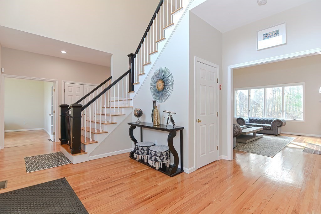 104 Channing Road Concord, MA 01742 - Photo 4 of 36 a view of a livingroom with furniture and hardwood floor