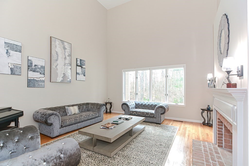 104 Channing Road Concord, MA 01742 - Photo 5 of 36 a living room with furniture and a large window