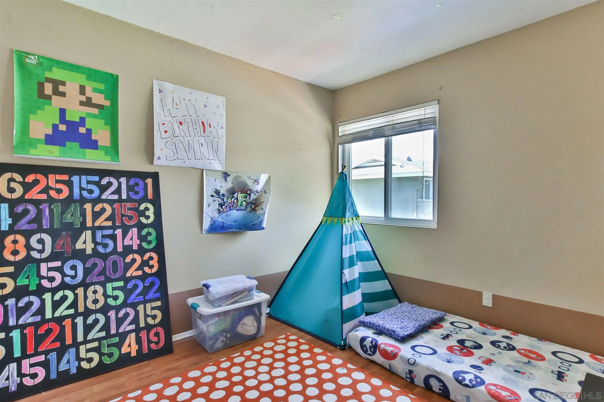 2502 Wanek Road, Unit B Escondido, CA 92027 - Photo 13 of 29 a bathroom with a toilet and a shower curtain