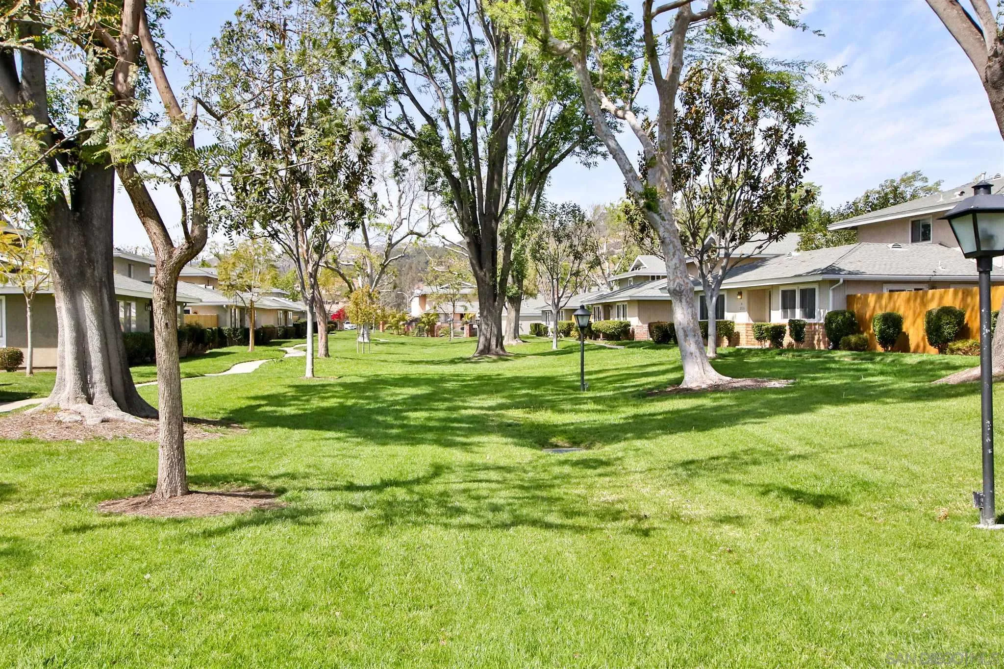 2502 Wanek Road, Unit B Escondido, CA 92027 - Photo 19 of 29 a view of a house with a yard