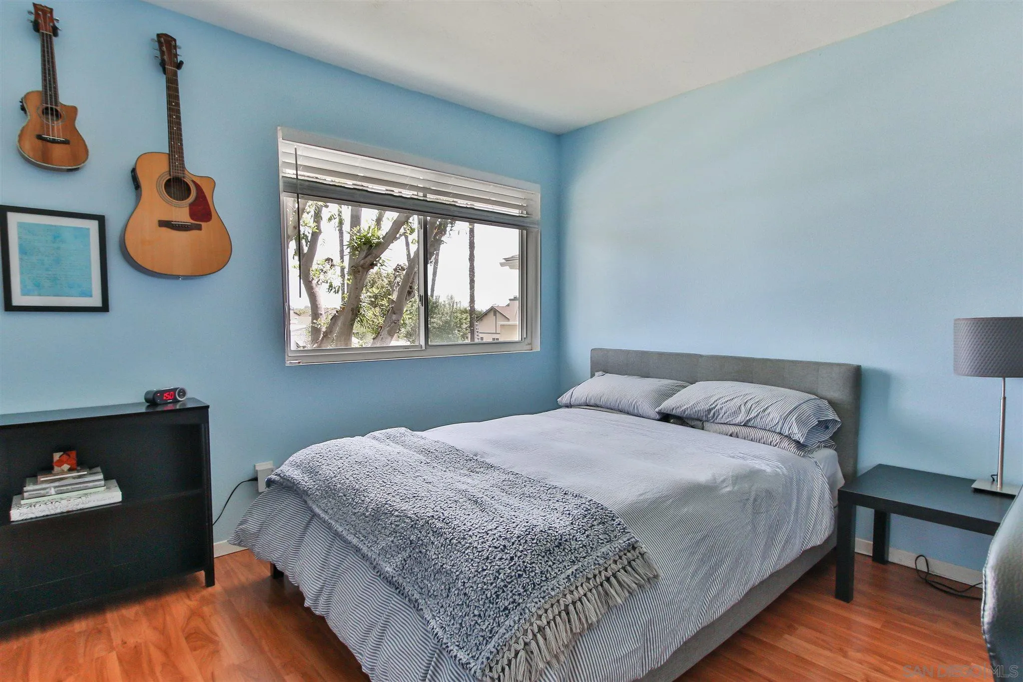 2502 Wanek Road, Unit B Escondido, CA 92027 - Photo 9 of 29 a bedroom with a bed and a window