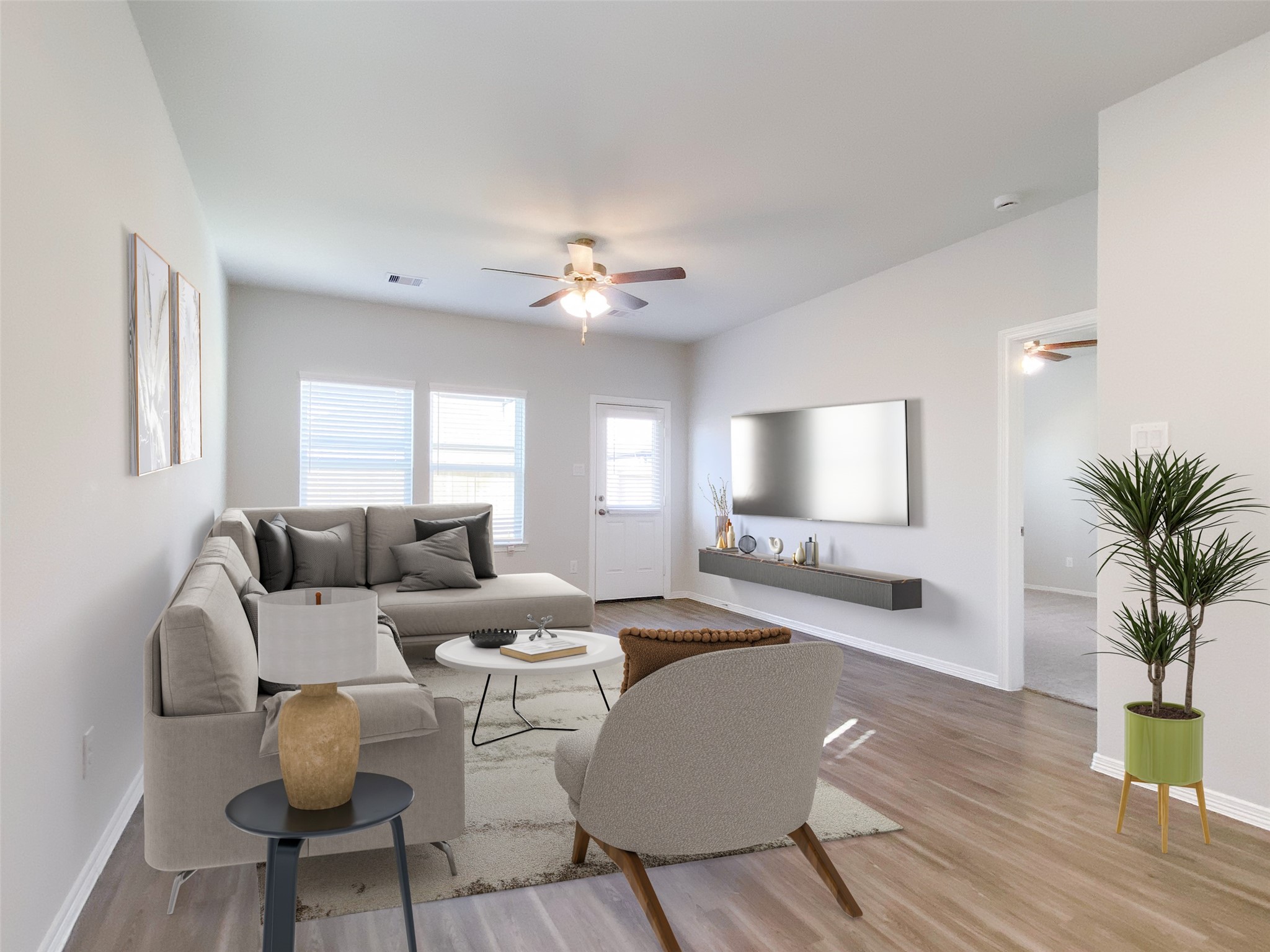 23338 Spring Genesis Lane Katy, TX 77493 - Photo 2 of 18 Spacious family room with ceiling fan overlooking the backyard (virtually staged)