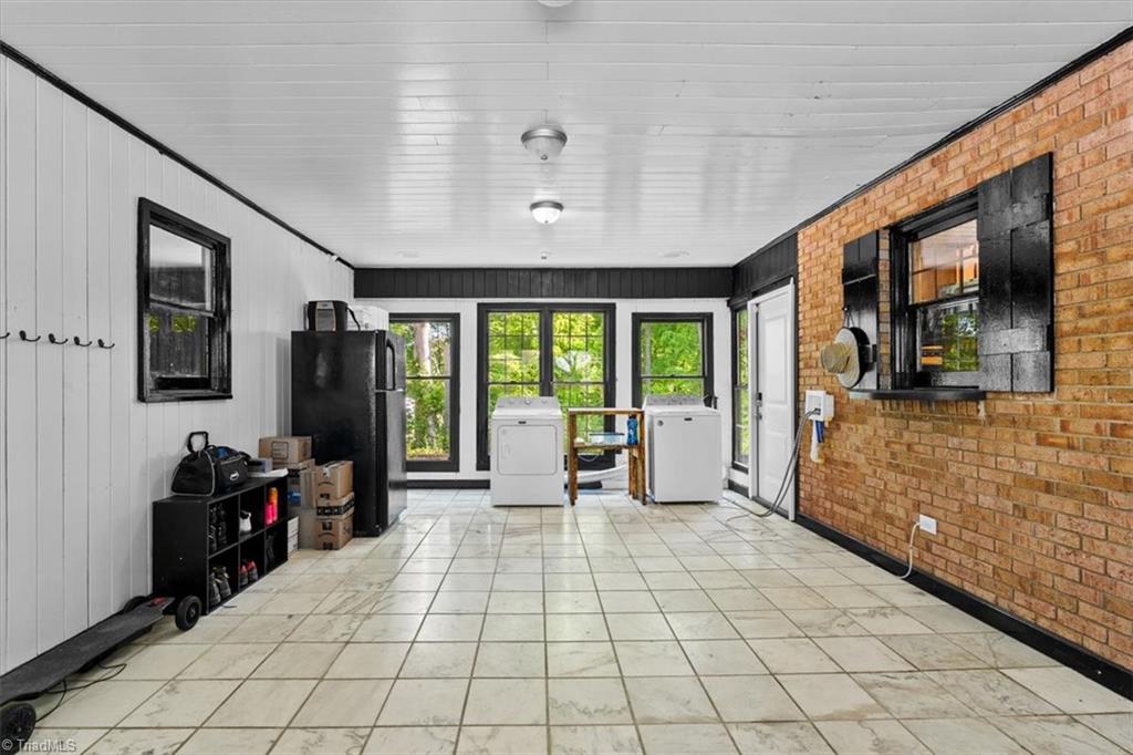 1861 Sandy Ridge Road Colfax, NC 27235 - Photo 40 of 47 drop zone/ mudroom space between attached garage and house