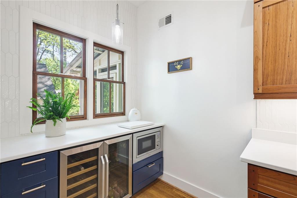 245 Forkner Drive Decatur, GA 30030 - Photo 11 of 31 a kitchen with a sink and a window