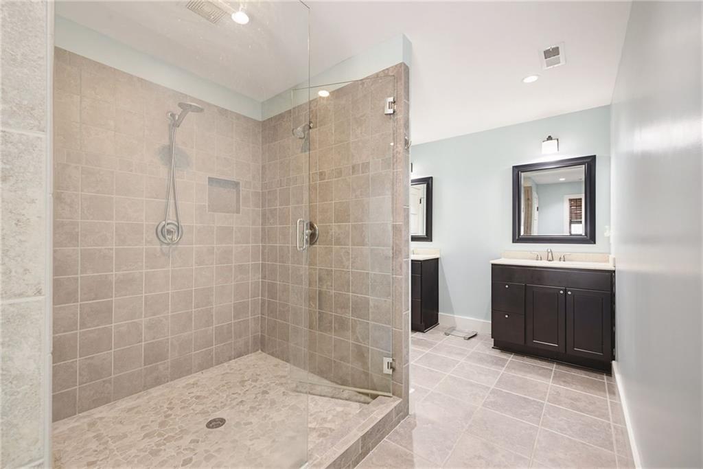 245 Forkner Drive Decatur, GA 30030 - Photo 22 of 31 a bathroom with a shower