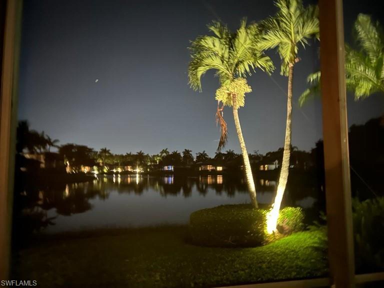 938 Spanish Moss Trail Naples, FL 34108 - Photo 5 of 11 a vase of flowers sitting on a table