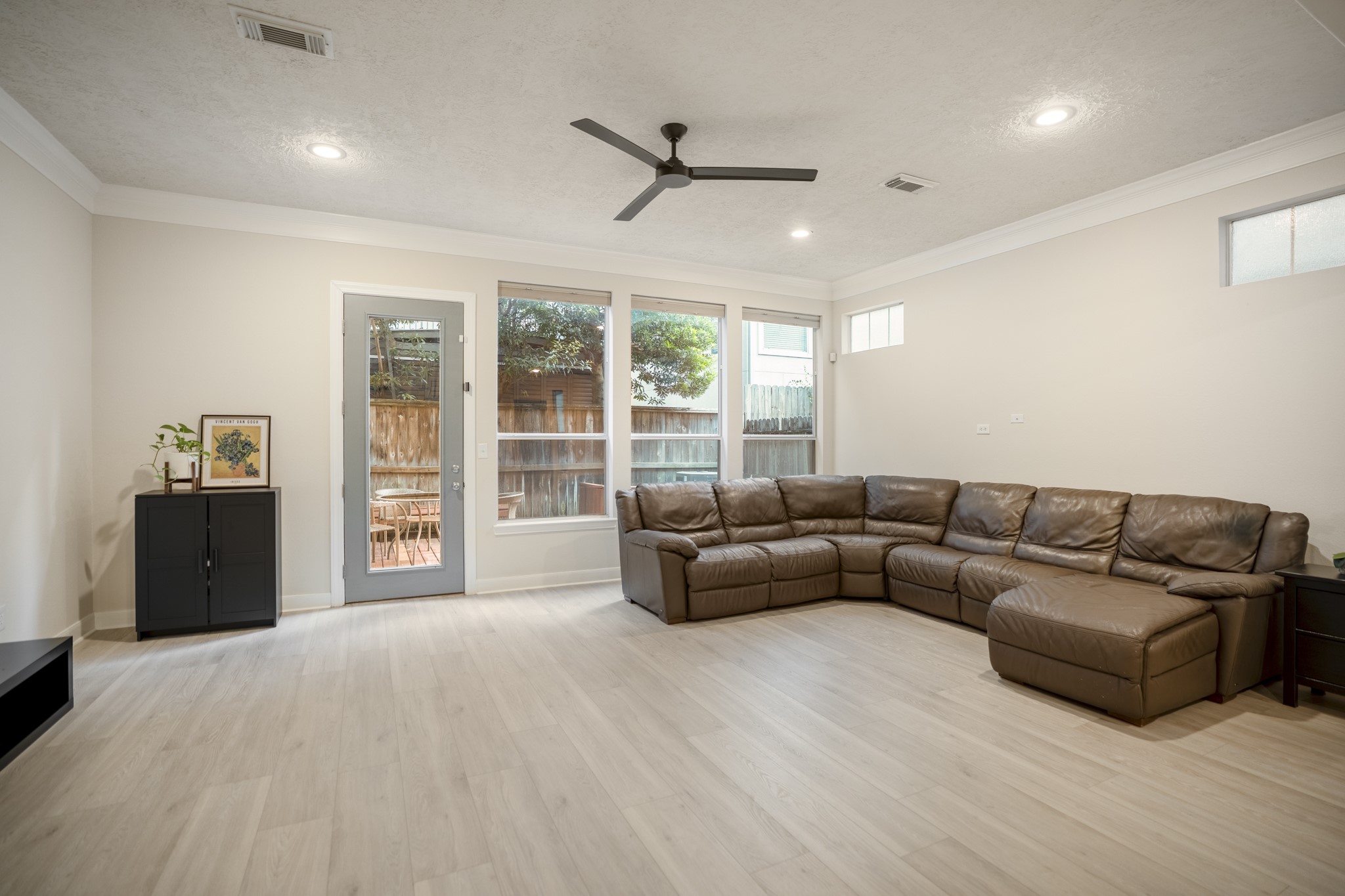 4236 Drake Street Houston, TX 77005 - Photo 13 of 43 Another angle of the living room looking into the backyard.