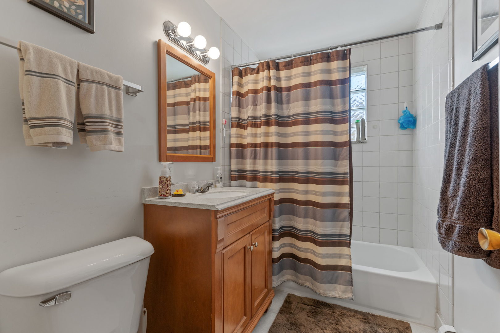 7535 Roberts Road Bridgeview, IL 60455 - Photo 12 of 30 a bathroom with a sink and a shower
