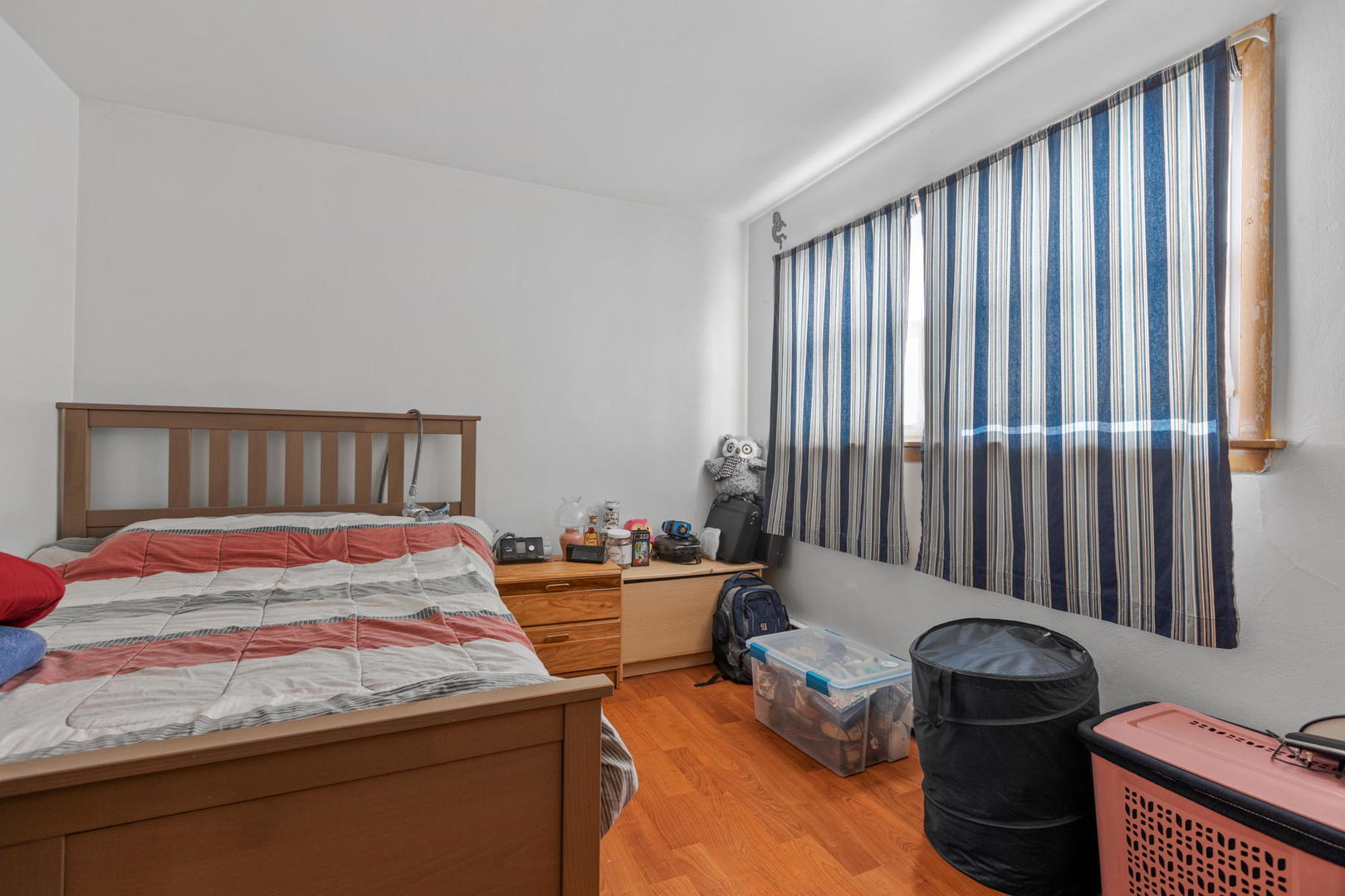 7535 Roberts Road Bridgeview, IL 60455 - Photo 13 of 30 a bedroom with a bed and a window