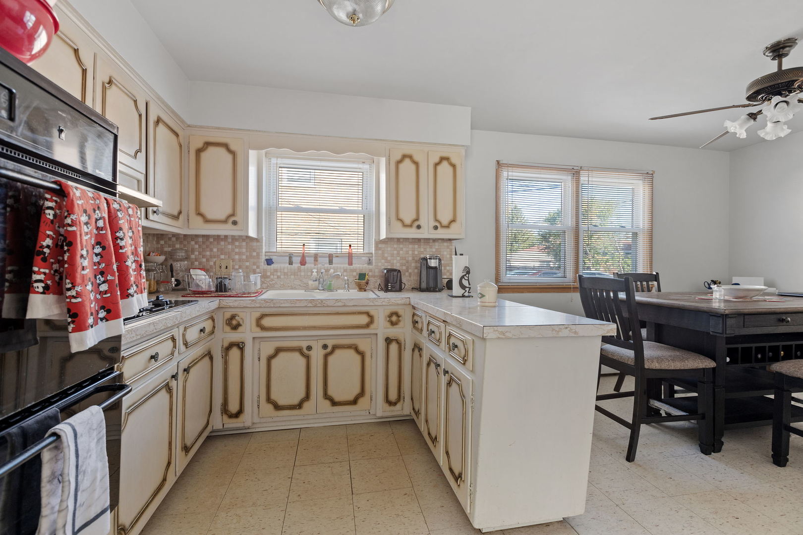 7535 Roberts Road Bridgeview, IL 60455 - Photo 14 of 30 a kitchen with stainless steel appliances lots of counter top space