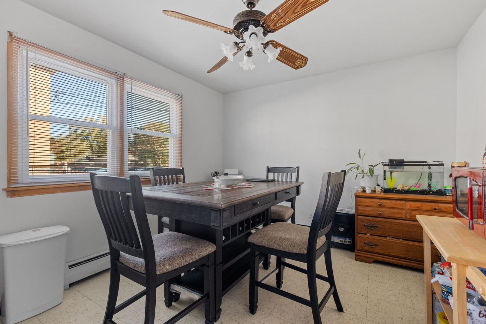 7535 Roberts Road Bridgeview, IL 60455 - Photo 15 of 30 a dining room with furniture and window